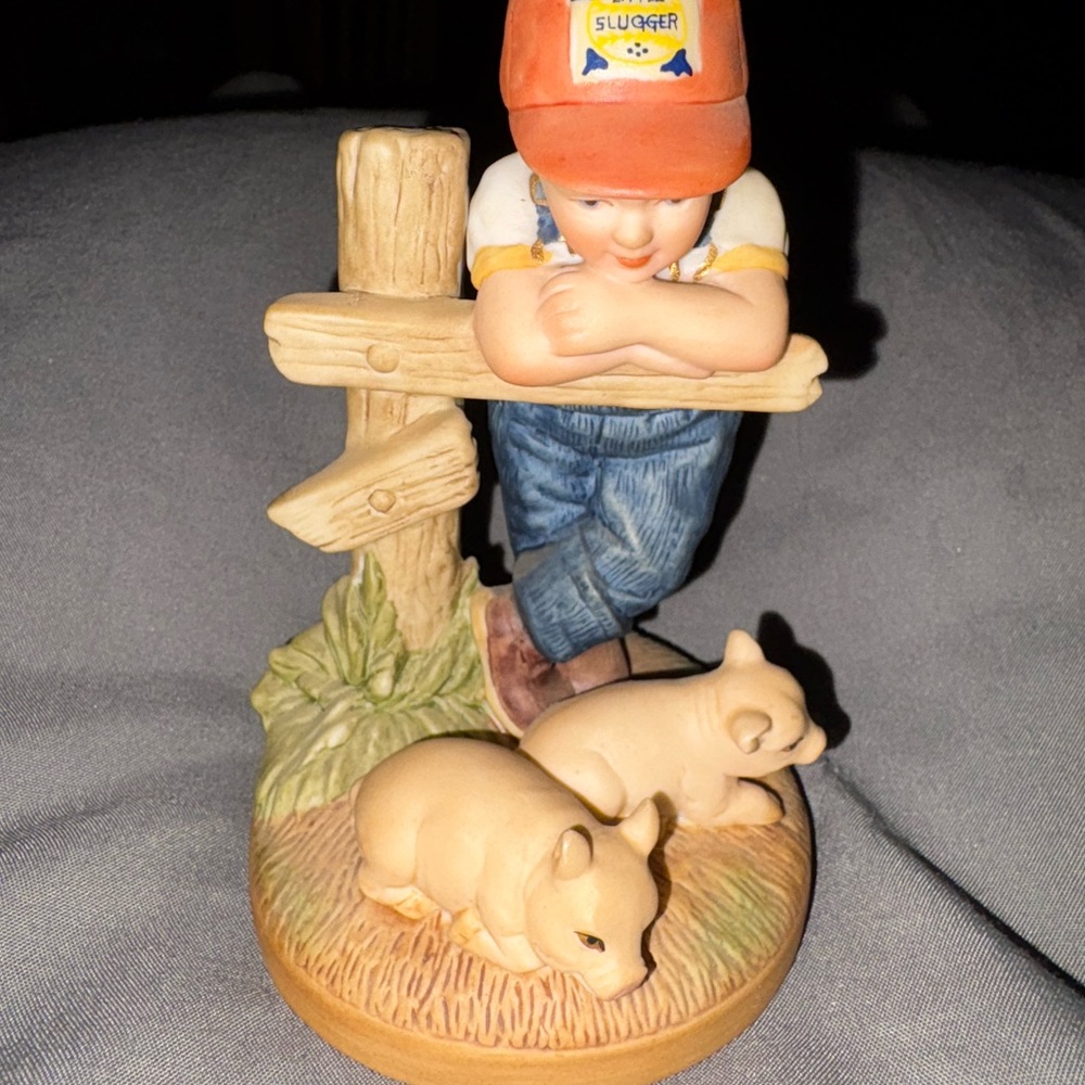 Country Store boy with his pigs